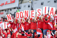 Pemain Timnas Indonesia tampil dalam pertandingan internasional, mencerminkan optimisme dan semangat baru sepak bola nasional.
(Credit: The Jakarta Post)