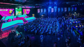 Ilustrasi pertandingan esports yang disaksikan ribuan penonton, mencerminkan pesatnya perkembangan industri game dan kompetisi digital global pada 2026.
Sumber: Istimewa