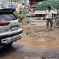Kondisi jalan rusak dan berlubang di Penjaringan, Jakut (Rachma Indira/detikcom)
