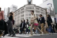 Foto: Warga negara Jepang. (AP Photo/Eugene Hoshiko)