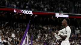 Vinicius Jr selebrasi usai cetak gol untuk Real Madrid. (REUTERS/Jon Nazca)