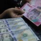 Logo Bank OCBC NISP yang terpampang di depan kantornya di Bandung, Indonesia pada Januari 2023. (Shutterstock/Lela Ungsu)