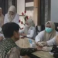 Suasana saat cek kesehatan gratis/sumber foto kemenag