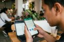Ilustrasi: Mengirim video ukuran besar di WhatsApp kini lebih mudah lewat berbagai trik praktis.(poto: AI).